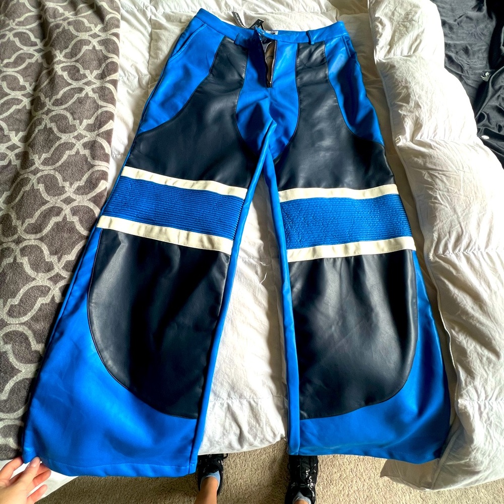 Black and blue faux leather pants.